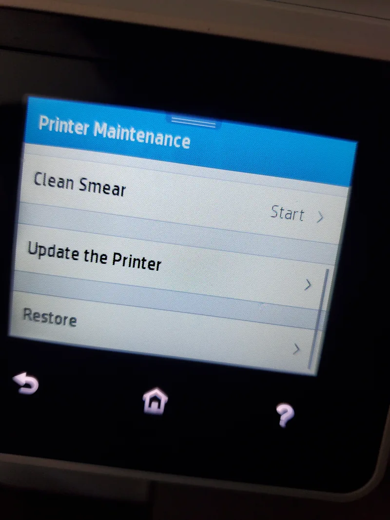 Printer maintenance menu showing the Clean Smear option