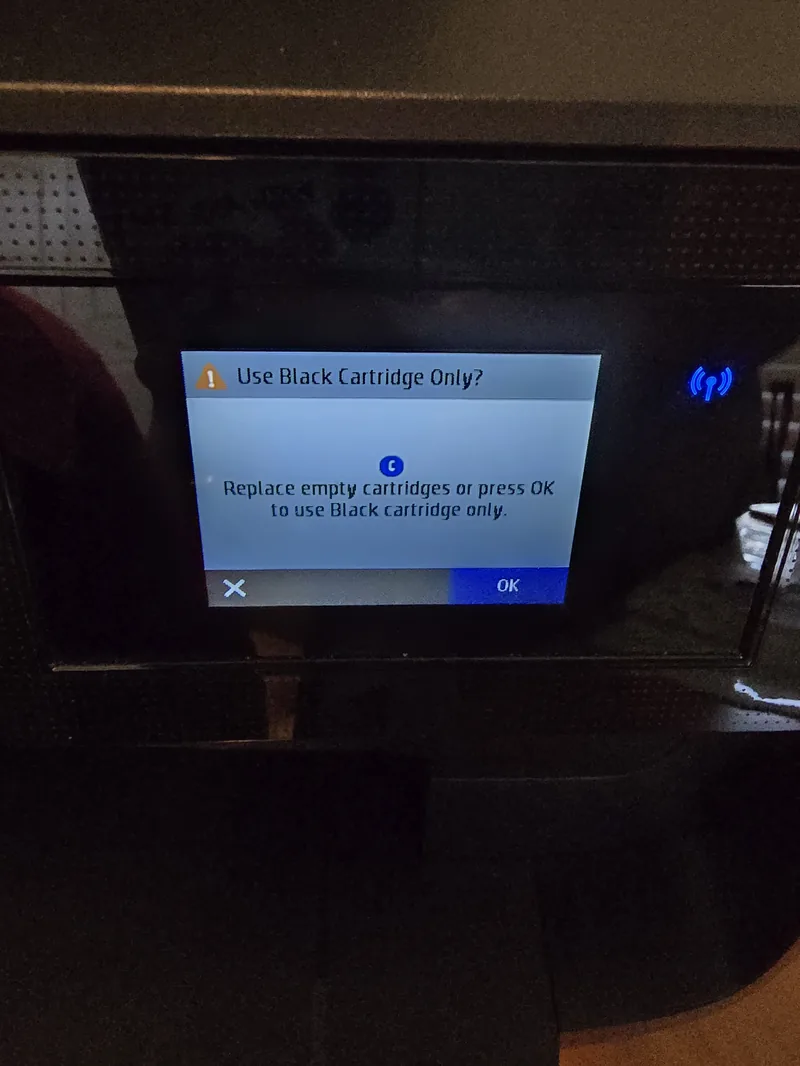 Printer prompting to replace empty cartridges or continue in black only