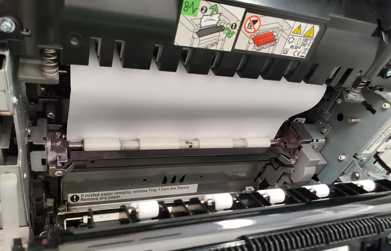 Paper path of a laser printer opened at the jam-clearance point