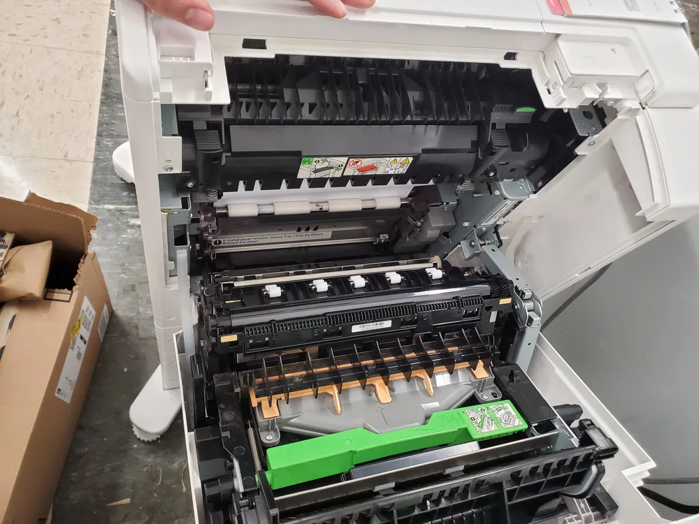 Fuser and transfer assembly exposed inside a laser printer